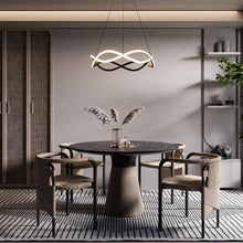 Load image into Gallery viewer, Swerve LED Chandelier in living room.
