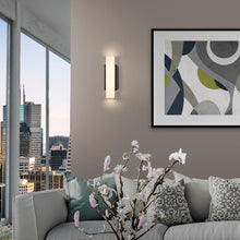 Load image into Gallery viewer, Volga LED Wall Light in living room.
