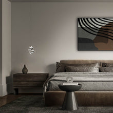 Load image into Gallery viewer, Whirl LED Pendant Light in bedroom.
