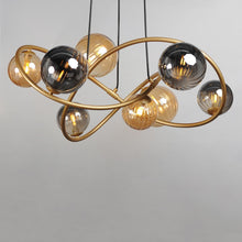 Load image into Gallery viewer, Planetary Chandelier in Detail.
