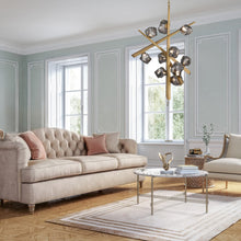 Load image into Gallery viewer, Thorah LED Chandelier in living room.
