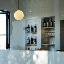 Load image into Gallery viewer, IC Light Pendant Light in dining room.
