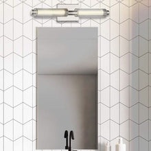 Load image into Gallery viewer, Double Barrel LED Bath Wall Light in bathroom.
