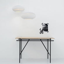 Load image into Gallery viewer, Disc Pendant Light in living room.
