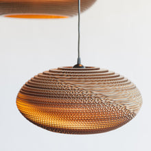 Load image into Gallery viewer, Disc Pendant Light in Detail.
