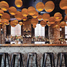 Load image into Gallery viewer, Moon Pendant Light in living room.
