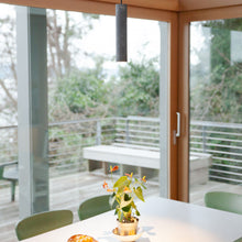 Load image into Gallery viewer, Roest Mini Pendant Light in dining room.
