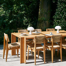 Load image into Gallery viewer, Obello LED Table Lamp in Outside Area.
