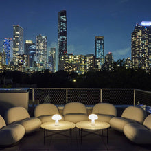 Load image into Gallery viewer, Obello LED Table Lamp in Outside Area.

