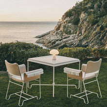 Load image into Gallery viewer, Obello LED Table Lamp in Outside Area.
