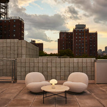 Load image into Gallery viewer, Obello LED Table Lamp in Outside Area.
