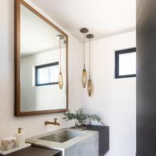 Load image into Gallery viewer, Rock Crystal LED Pendant Light in bathroom.
