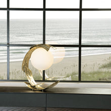 Load image into Gallery viewer, Crest Table Lamp in living room.
