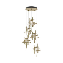 Load image into Gallery viewer, Tura Multi Light Pendant Light in Modern Brass/Seeded Clear Glass (Standard/5-Light).
