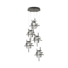 Load image into Gallery viewer, Tura Multi Light Pendant Light in Natural Iron/Seeded Clear Glass (Standard/5-Light).

