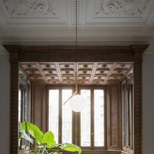 Load image into Gallery viewer, IC Light Pendant Light in living room.
