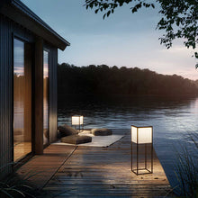 Load image into Gallery viewer, Fil Outdoor LED Solar Portable Floor Lamp in Outside Area.
