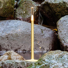 Load image into Gallery viewer, Glim Outdoor LED Portable Table Lamp in Outside Area.
