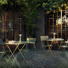 Load image into Gallery viewer, Lix Outdoor LED Portable Table Lamp in Outside Area.
