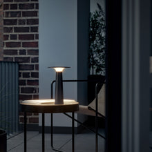 Load image into Gallery viewer, Lix Outdoor LED Portable Table Lamp in Outside Area.
