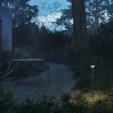 Load image into Gallery viewer, Lix Spike Outdoor LED Solar Bollard in Outside Area.
