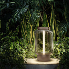 Load image into Gallery viewer, Qu Outdoor LED Portable Table Lamp in Outside Area.

