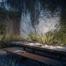 Load image into Gallery viewer, Qua Outdoor LED Solar Portable Table Lamp in Outside Area.
