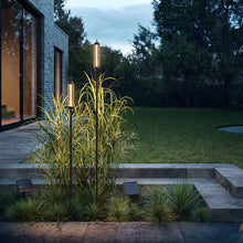 Load image into Gallery viewer, Reed Outdoor LED Solar Bollard in Outside Area.
