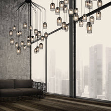 Load image into Gallery viewer, Constellation Chandelier in living room.
