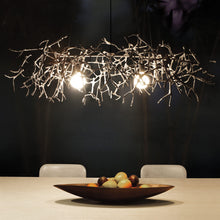 Load image into Gallery viewer, Little People Chandelier in dining room.
