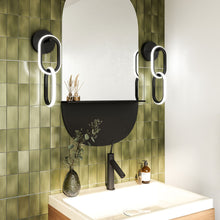Load image into Gallery viewer, Airen LED Wall Light in bathroom.
