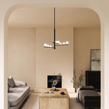 Load image into Gallery viewer, Juniper LED Chandelier in living room.
