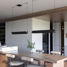 Load image into Gallery viewer, Phoenix LED Linear Pendant Light in dining room.
