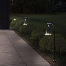 Load image into Gallery viewer, Trek Outdoor LED Landscape Light in Outside Area.
