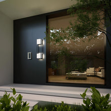 Load image into Gallery viewer, Vail Outdoor LED Wall Light in Outside Area.
