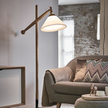 Load image into Gallery viewer, 325 Floor Lamp in living room.
