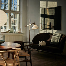 Load image into Gallery viewer, 325 Floor Lamp in living room.
