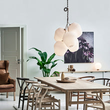 Load image into Gallery viewer, Bouquet Pendant Light in dining room.
