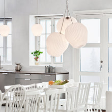 Load image into Gallery viewer, Bouquet Pendant Light in dining room.
