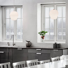 Load image into Gallery viewer, Bouquet Pendant Light in dining room.
