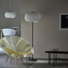 Load image into Gallery viewer, Lamella Floor Lamp in living room.
