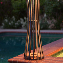 Load image into Gallery viewer, Corsetta Outdoor Solar LED Pathway Light in Outside Area.
