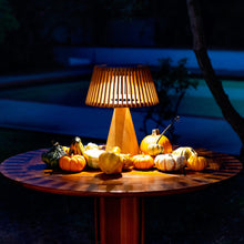 Load image into Gallery viewer, Enoki Outdoor Solar LED Table Lamp in Outside Area.
