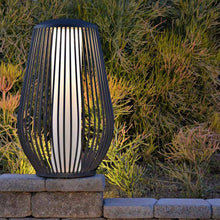 Load image into Gallery viewer, Mandaley Outdoor Solar LED Floor Lamp in Outside Area.
