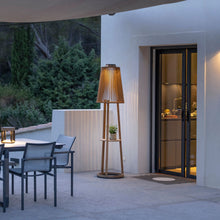 Load image into Gallery viewer, Palma Outdoor Solar LED Floor Lamp in Outside Area.
