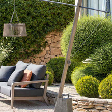 Load image into Gallery viewer, Pendulum Outdoor Solar LED Floor Lamp in Outside Area.
