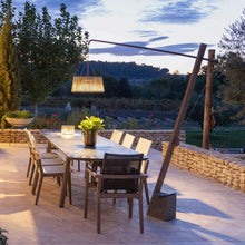 Load image into Gallery viewer, Pendulum Outdoor Solar LED Floor Lamp in Outside Area.
