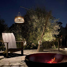 Load image into Gallery viewer, Pendulum Outdoor Solar LED Floor Lamp in Outside Area.
