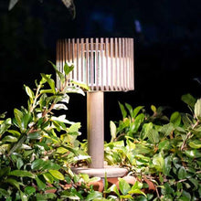 Load image into Gallery viewer, Pixy Outdoor Solar LED Table Lamp in Outside Area.
