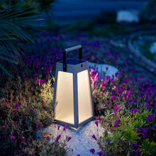 Load image into Gallery viewer, Roam Outdoor Solar LED Lantern in Outside Area.
